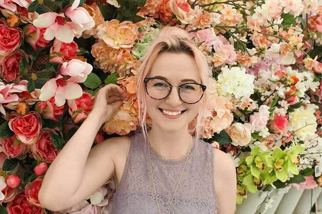 girl-in-front-of-flowers